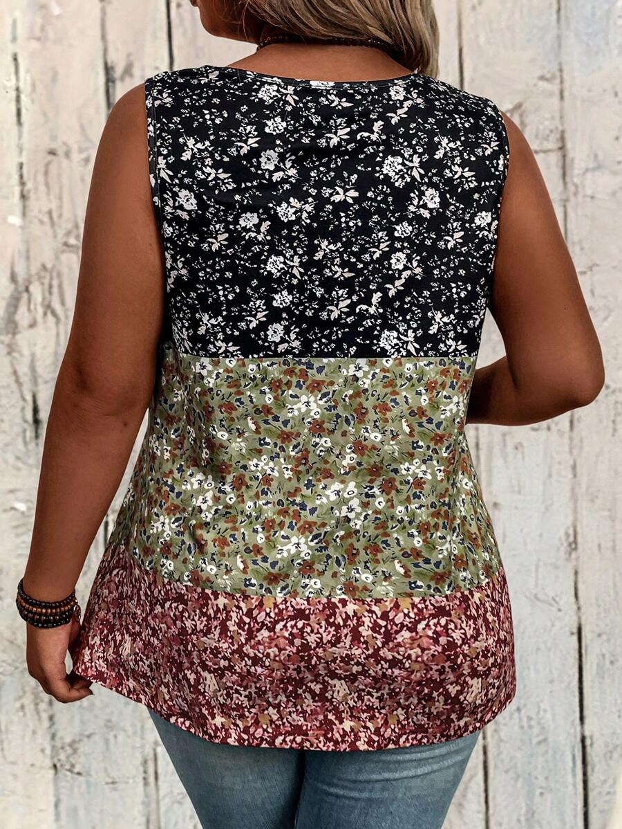 Woman wearing a sleeveless floral top with a wooden background